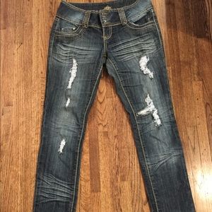 Size 9 distressed skinny jeans.